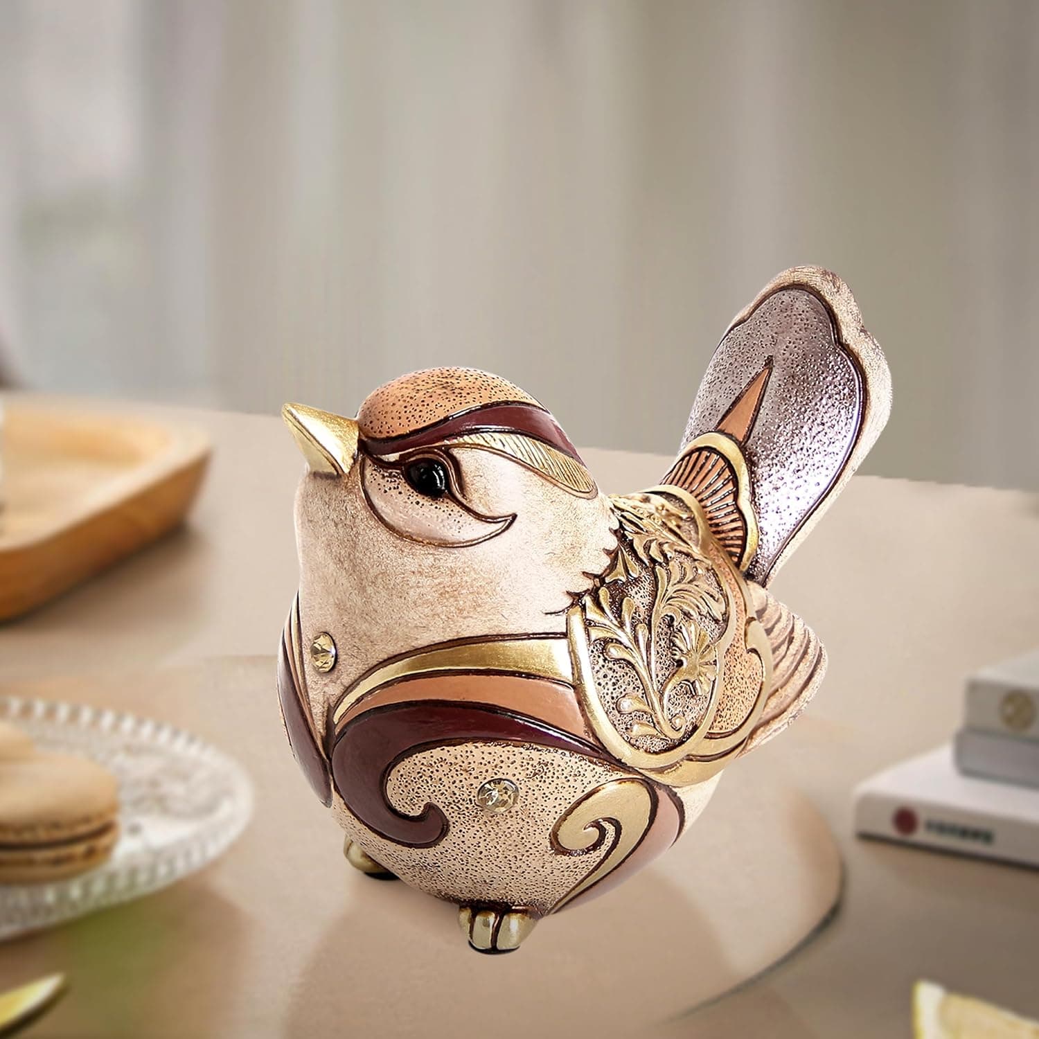 Cream and gold resin boho bird figurine with floral details for shelves, mantels, and cozy farmhouse home decor. detail view 5
