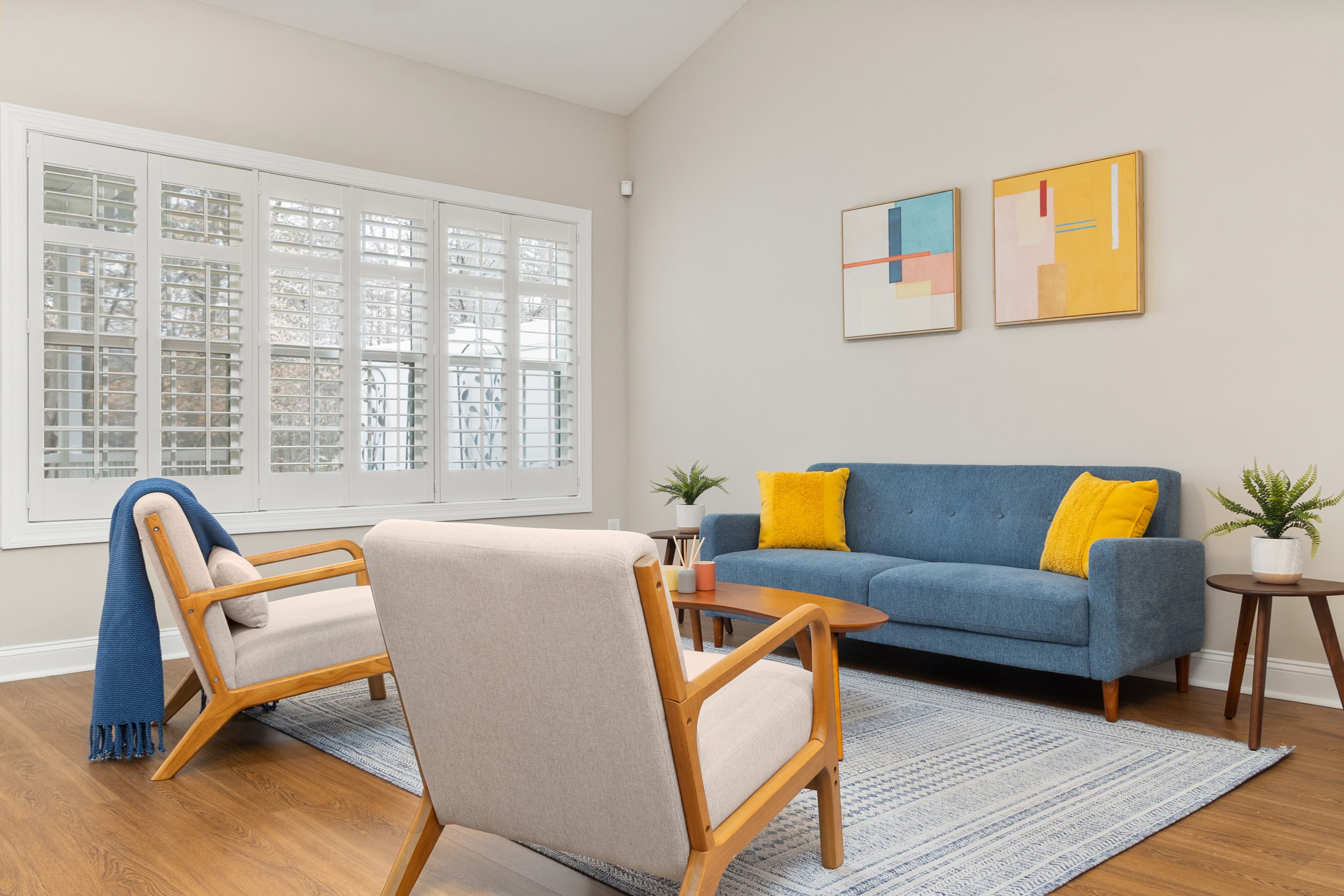 Calm neutral living room styled with curated home decor