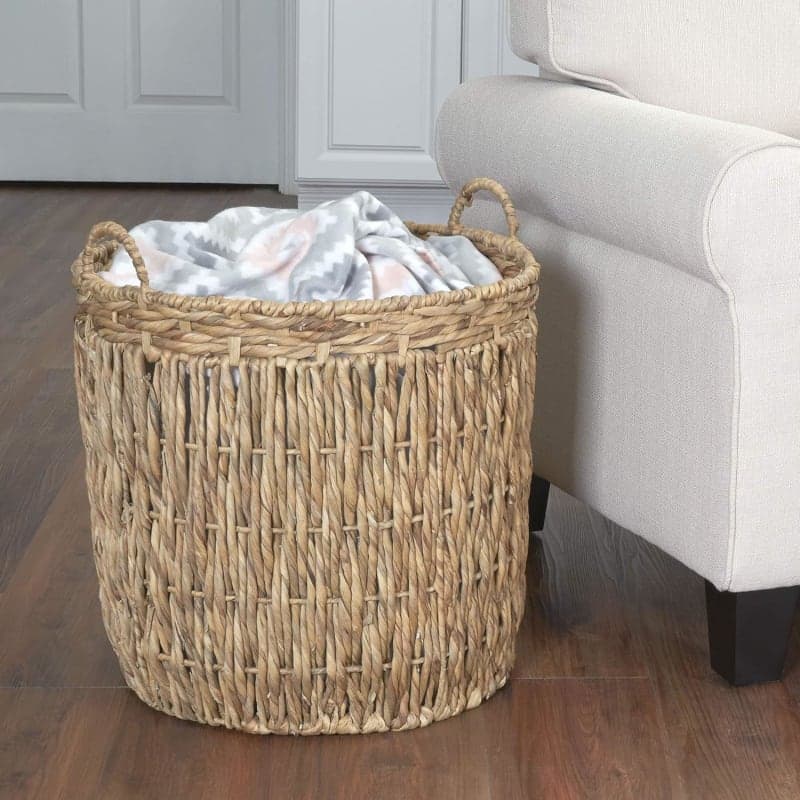 Tall natural woven wicker basket with handles, handmade rustic floor storage for laundry and blankets in a living room. gallery view 4