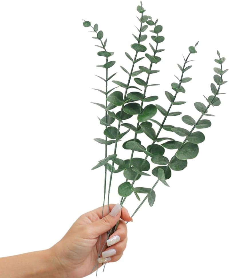 Green faux eucalyptus stems styled in a vase for dining table and home decor gallery view 2