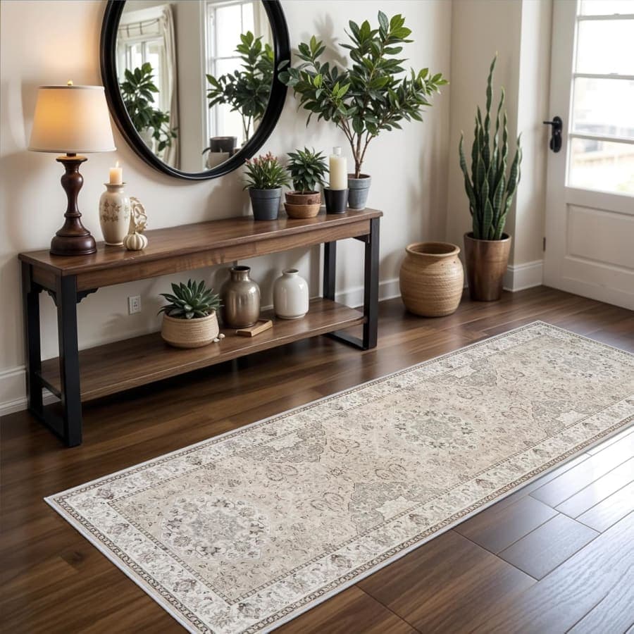 Cream vintage washable runner rug with distressed pattern and non slip backing for hallways, kitchens, and entryways.