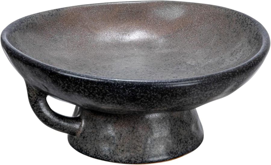 Black reactive glaze stoneware bowl with handle and base for modern tabletop decor.