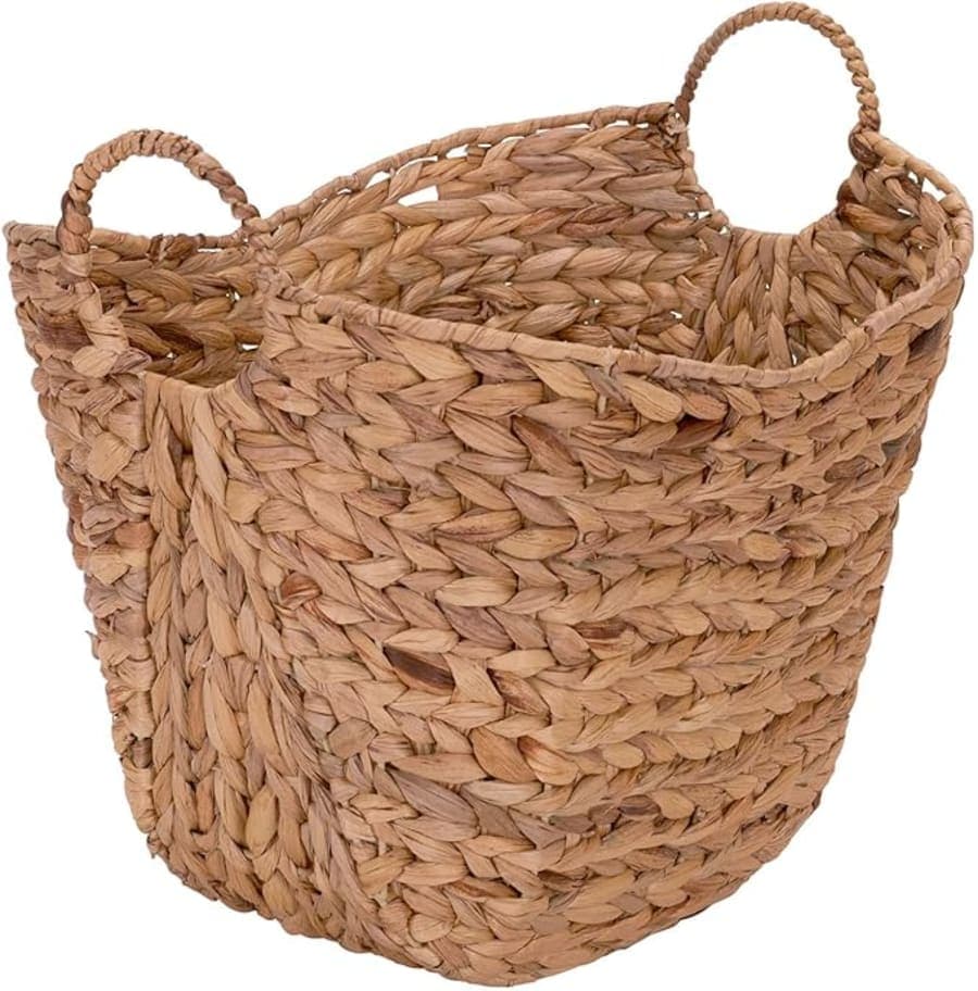 Natural water hyacinth wicker basket with handles for warm storage and home organization.