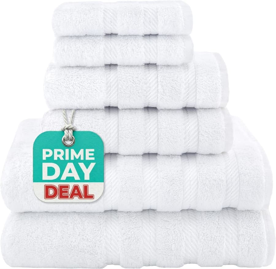 White cotton towel set with bath towels, hand towels, and washcloths for a soft bathroom refresh