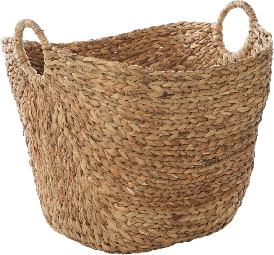 Large brown woven seagrass storage basket with ring handles for neutral home organization