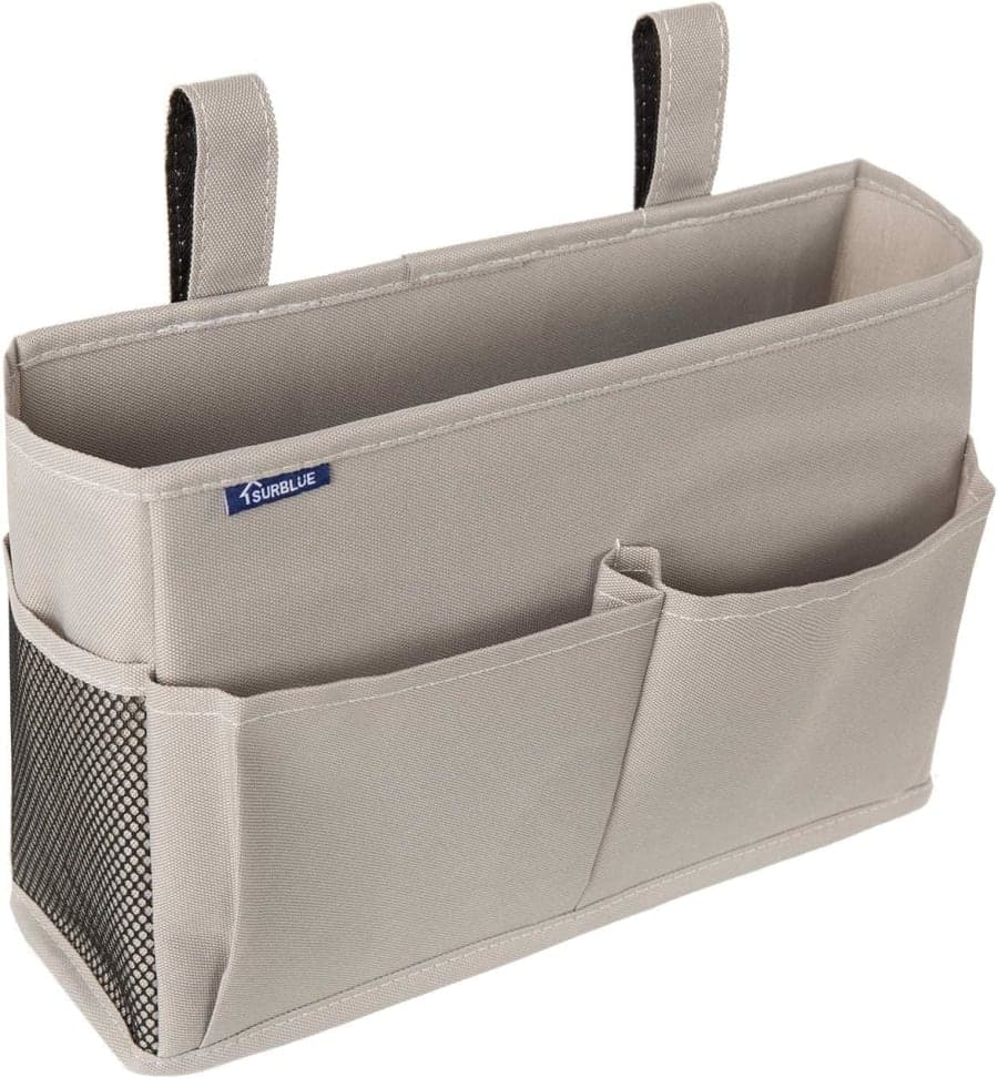 Gray fabric bedside storage caddy with pockets and hooks for dorm room or small bedroom organization