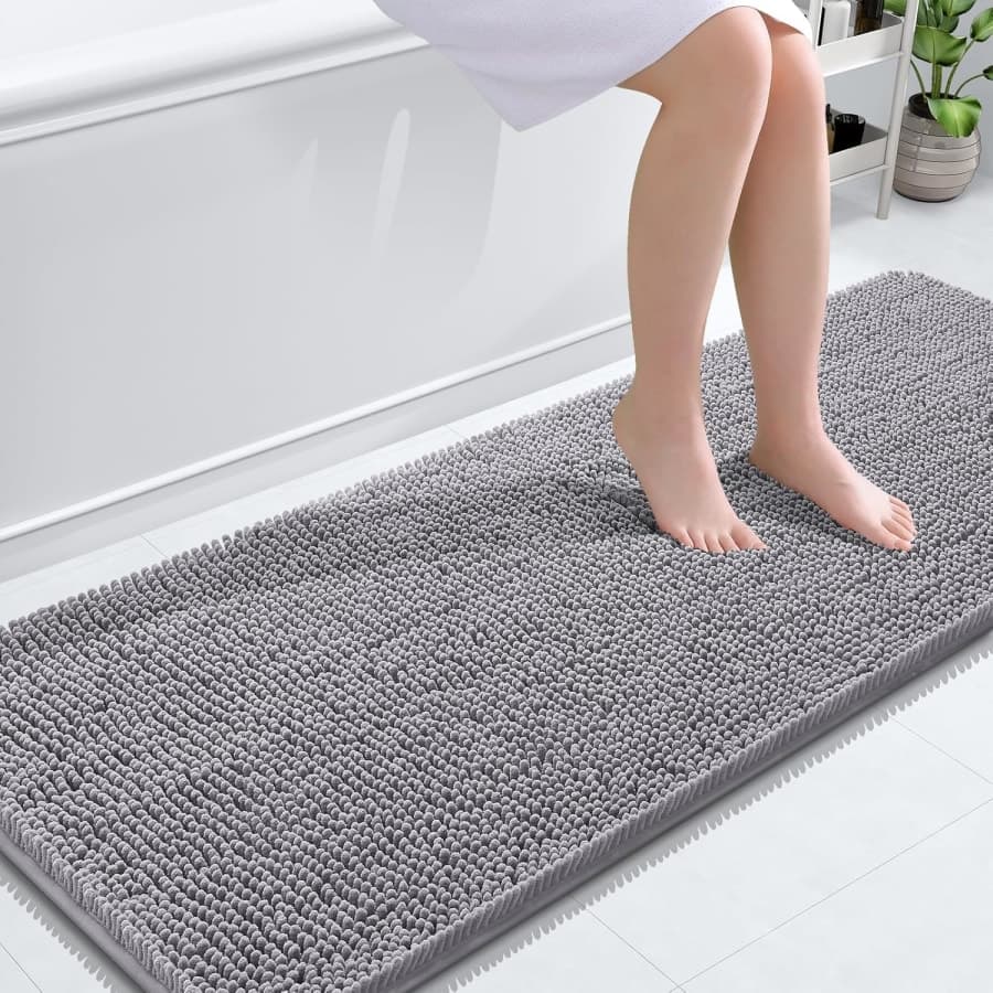 Grey chenille bathroom runner rug with soft texture for tub, shower, and vanity floor spaces